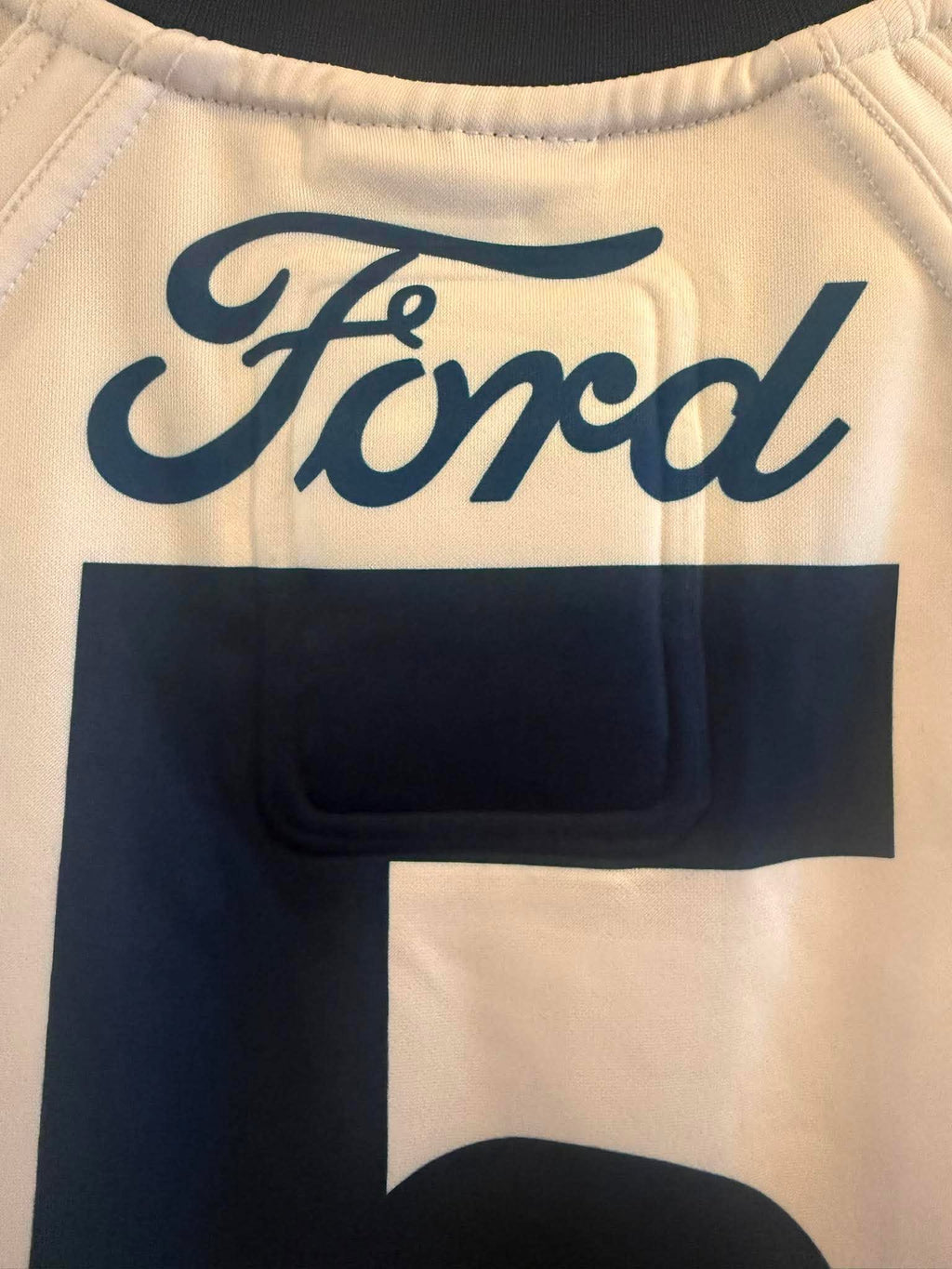 Official AFL Jeremy Cameron Geelong Cats regional round player issue guernsey, orange and navy jersey with team logo and player number.