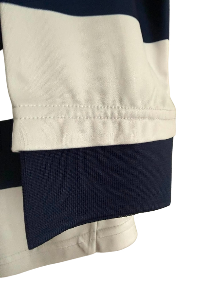 Geelong Cats 2023 AFL ANZAC long sleeve jersey by Cotton On, featuring team logo and official player issue design.